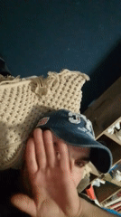 Couch selfies with stuffed animals and a heart pillow, Wedel