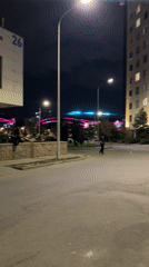 Nighttime residential street scene in Almaty