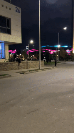 Nighttime residential street scene in Almaty