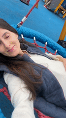Woman enjoys swing at Wisła playground