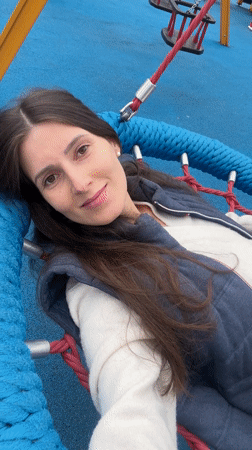 Woman enjoys swing at Wisła playground