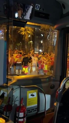 Barcelona streets packed with flag-waving crowds at night