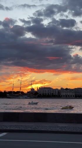 Saint Petersburg waterfront at golden hour, summer evening