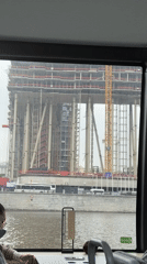 Tourist boat journey documents Moscow riverfront landmarks and construction