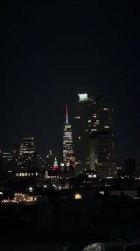NYC rooftop night: skyline views, soccer screening, magazine stack