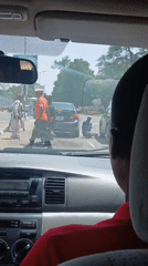 Ordinary street life captured at intersection during morning hours