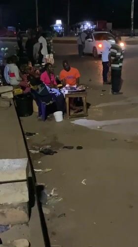 Nighttime street market bustles in Bukuru, Nigeria