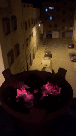 Two women sit with guitar in Safi, Morocco