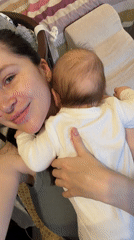Mother and baby share quiet afternoon moments in Khimki home