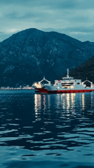 Ferry operates at dusk in Montenegro bay waters