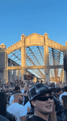 Crowd gathers for outdoor event at Milan ruins