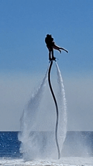 Kemer beach in full swing — volleyball, flyboarding, and coastline life