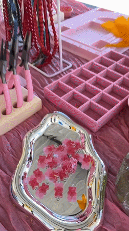 Outdoor jewelry-making workshop in Birobidzhan with crafts and food