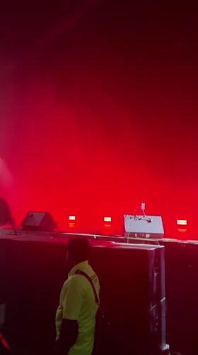 Live concert unfolds under colored stage lights in Mexico City