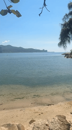 Tourist captures scenic waterfront moments in Nha Trang Vietnam