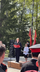 Woman delivers speech to military crowd in Chuprino, Russia