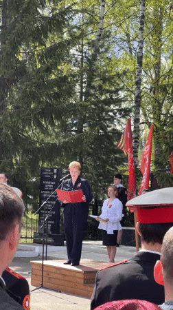 Woman delivers speech to military crowd in Chuprino, Russia