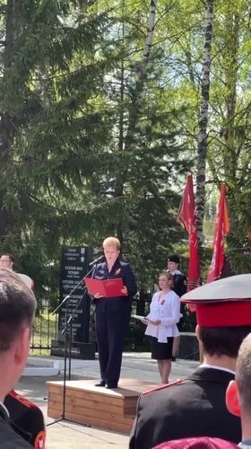 Woman delivers speech to military crowd in Chuprino, Russia