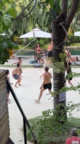 Beach volleyball and pedestrian activity observed at General Luna resort