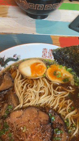 Diner documents Asian meal with ramen, dumplings in Saint Petersburg