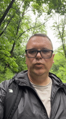 Kyiv park visitor documents wet pathways, wildlife, fallen branches