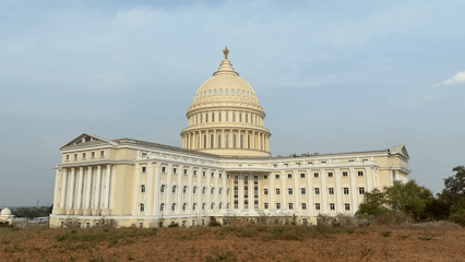 Capitol-like dome and clock tower documented in Tirnahalli