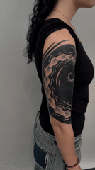Woman receives tattoo work in Sofia, Bulgaria