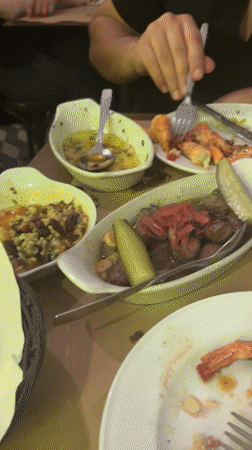 Diner enjoys tapas meal at Lisbon restaurant
