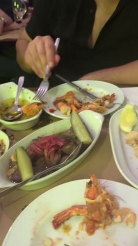 Diner enjoys tapas meal at Lisbon restaurant