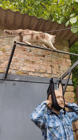Man attempts neck stretching device outdoors in Ukraine