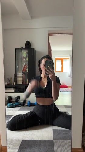 Woman takes fitness selfie in mirror in Svilengrad