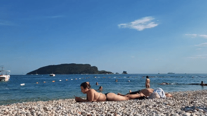 A summer afternoon across Budva's beaches, streets, and cafés.