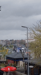 Rainy day street life documented across Istanbul neighborhoods