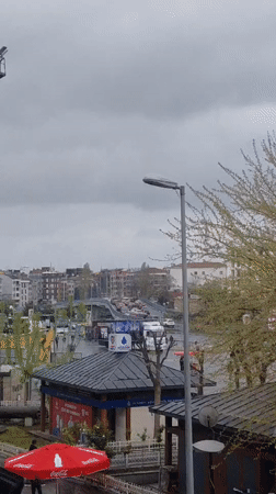 Rainy day street life documented across Istanbul neighborhoods