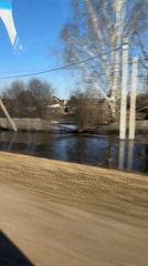 Flooding documented in rural Kuyeda, Russia affects wooden houses
