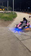 LED go-karts light up a park path in Arica at night