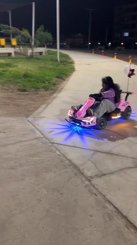LED go-karts light up a park path in Arica at night