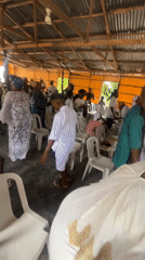 Religious service held in community hall in Iranla, Nigeria