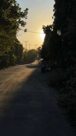 Sunset road scenes documented across Ungasan, Indonesia