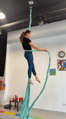 Woman practices aerial silks at Montenegro studio