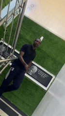 Man descends staircase in Gura Top, Nigeria