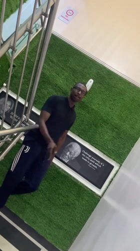 Man descends staircase in Gura Top, Nigeria