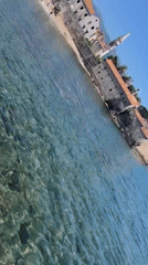 Woman and child enjoy leisurely morning exploring historic Budva