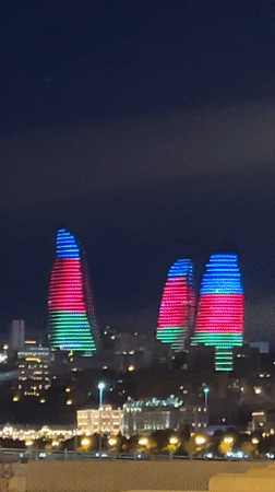 Baku's Flame Towers glow in Azerbaijani flag colors at night