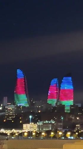 Baku's Flame Towers glow in Azerbaijani flag colors at night