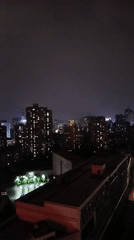 Nighttime cityscape observed in Jiulongpo District, China
