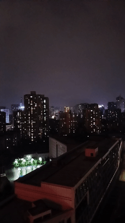 Nighttime cityscape observed in Jiulongpo District, China