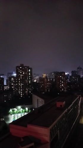 Nighttime cityscape observed in Jiulongpo District, China