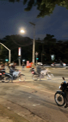 Night crowd moves through São Paulo streets toward governor's palace