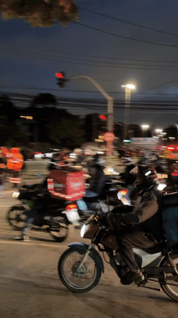 Night crowd moves through São Paulo streets toward governor's palace
